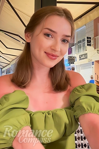 Ukrainian mail order bride Diana from Kyiv with light brown hair and green eye color - image 1