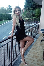 Ukrainian mail order bride Elina from Hamburg with blonde hair and blue eye color - image 13