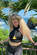 Ukrainian mail order bride Elina from Hamburg with blonde hair and blue eye color - image 8