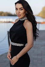 Ukrainian mail order bride Oksana from Kyiv with black hair and green eye color - image 6