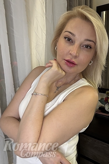 Ukrainian mail order bride Olena from Odesa with blonde hair and brown eye color - image 1