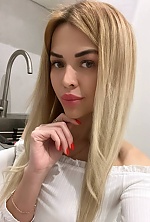 Ukrainian mail order bride Nina from Kyiv with blonde hair and green eye color - image 5