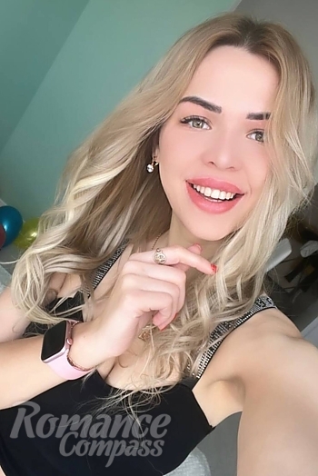 Ukrainian mail order bride Nina from Kyiv with blonde hair and green eye color - image 1