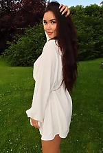 Ukrainian mail order bride Akbota from Astana with black hair and brown eye color - image 3