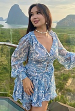 Ukrainian mail order bride Akbota from Astana with black hair and brown eye color - image 4