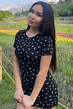 Ukrainian mail order bride Akbota from Astana with black hair and brown eye color - image 6