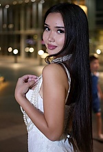 Ukrainian mail order bride Akbota from Astana with black hair and brown eye color - image 2