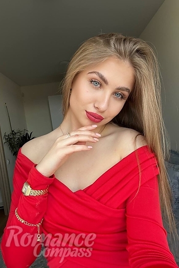 Ukrainian mail order bride Yuliia from Kyiv with blonde hair and blue eye color - image 1