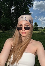 Ukrainian mail order bride Yuliia from Kyiv with blonde hair and blue eye color - image 7