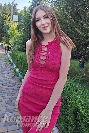 Ukrainian mail order bride Iryna from Cherkasy with light brown hair and blue eye color - image 1