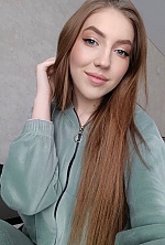Ukrainian mail order bride Iryna from Cherkasy with light brown hair and blue eye color - image 3