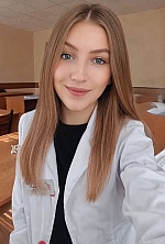 Ukrainian mail order bride Iryna from Cherkasy with light brown hair and blue eye color - image 4