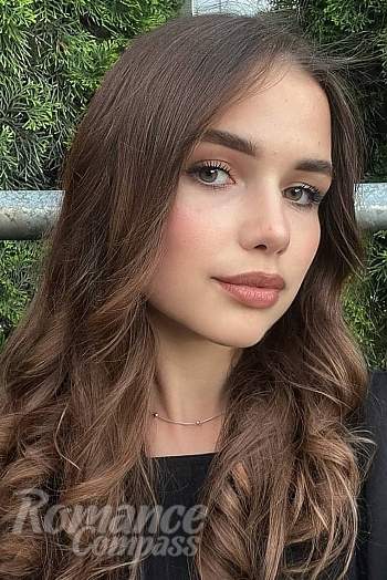 Ukrainian mail order bride Polina from Kyiv with light brown hair and green eye color - image 1
