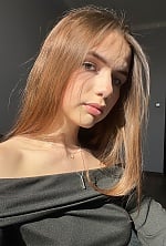 Ukrainian mail order bride Polina from Kyiv with light brown hair and green eye color - image 8