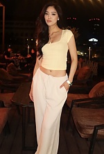 Ukrainian mail order bride Makhabat from Astana with brunette hair and brown eye color - image 11