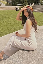 Ukrainian mail order bride Makhabat from Astana with brunette hair and brown eye color - image 13