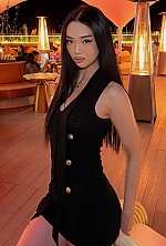 Ukrainian mail order bride Makhabat from Astana with brunette hair and brown eye color - image 3