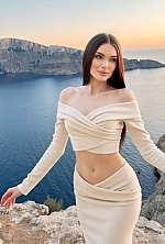 Ukrainian mail order bride Kseniia from Kyiv with light brown hair and green eye color - image 2