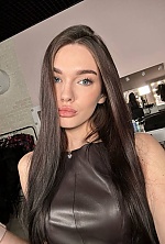 Ukrainian mail order bride Kseniia from Kyiv with light brown hair and green eye color - image 8