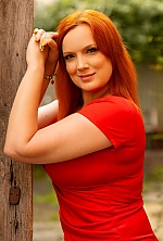 Ukrainian mail order bride Olga from Lviv with red hair and blue eye color - image 10