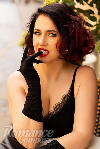 Ukrainian mail order bride Liudmyla from Lviv with red hair and blue eye color - image 1