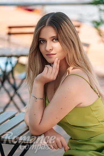 Ukrainian mail order bride Diana from Lviv with blonde hair and green eye color - image 1