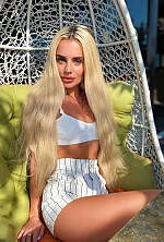 Ukrainian mail order bride Ilona from Kharkiv with blonde hair and blue eye color - image 38