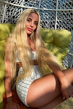 Ukrainian mail order bride Ilona from Kharkiv with blonde hair and blue eye color - image 37