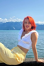 Ukrainian mail order bride Natalia from Kyiv with red hair and blue eye color - image 5