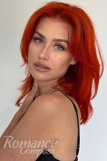 Ukrainian mail order bride Natalia from Kyiv with red hair and blue eye color - image 1