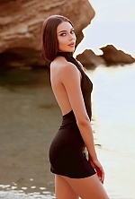 Ukrainian mail order bride Diana from Kyiv with black hair and green eye color - image 2