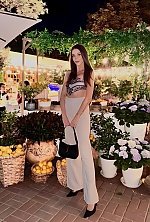Ukrainian mail order bride Diana from Kyiv with black hair and green eye color - image 8