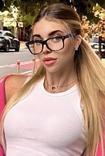 Ukrainian mail order bride Diana from Kyiv with black hair and green eye color - image 9