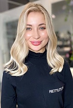 Ukrainian mail order bride Vasylyna from Lviv with blonde hair and blue eye color - image 16