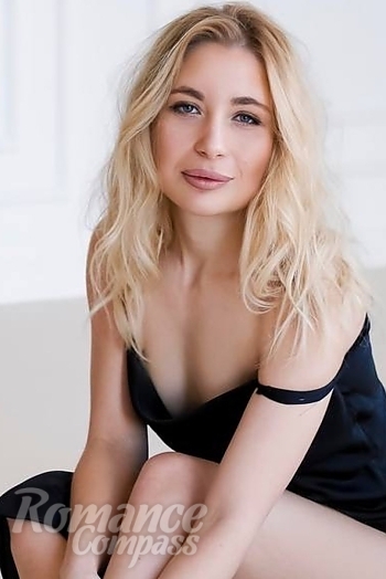 Ukrainian mail order bride Vasylyna from Lviv with blonde hair and blue eye color - image 1