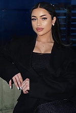 Ukrainian mail order bride Valeria from Kyiv with black hair and green eye color - image 10