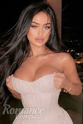 Ukrainian mail order bride Valeria from Kyiv with black hair and green eye color - image 1