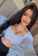 Ukrainian mail order bride Valeria from Kyiv with black hair and green eye color - image 14
