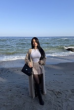 Ukrainian mail order bride Valeria from Kyiv with black hair and green eye color - image 11