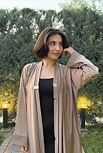 Ukrainian mail order bride Tahmina from Ashgabat with light brown hair and green eye color - image 7