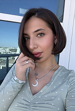Ukrainian mail order bride Tahmina from Ashgabat with light brown hair and green eye color - image 6