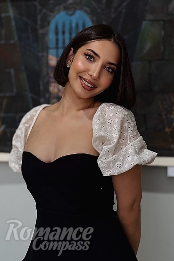 Ukrainian mail order bride Tahmina from Ashgabat with light brown hair and green eye color - image 1