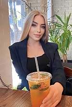 Ukrainian mail order bride Olga from Kyiv with blonde hair and blue eye color - image 6