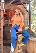 Ukrainian mail order bride Olga from Kyiv with blonde hair and blue eye color - image 7