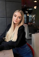 Ukrainian mail order bride Olga from Kyiv with blonde hair and blue eye color - image 5