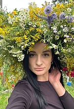 Ukrainian mail order bride Viktoriia from Kyiv with black hair and brown eye color - image 10