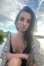 Ukrainian mail order bride Viktoriia from Kyiv with black hair and brown eye color - image 9
