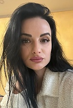 Ukrainian mail order bride Viktoriia from Kyiv with black hair and brown eye color - image 12