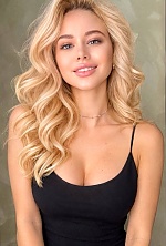 Ukrainian mail order bride Nataliia from Rivne with blonde hair and green eye color - image 3