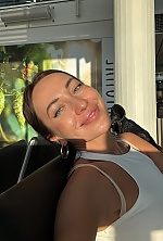 Ukrainian mail order bride Victoria from Munich with brunette hair and blue eye color - image 4